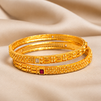 Elegant Ruby Embellished Gold Bangles